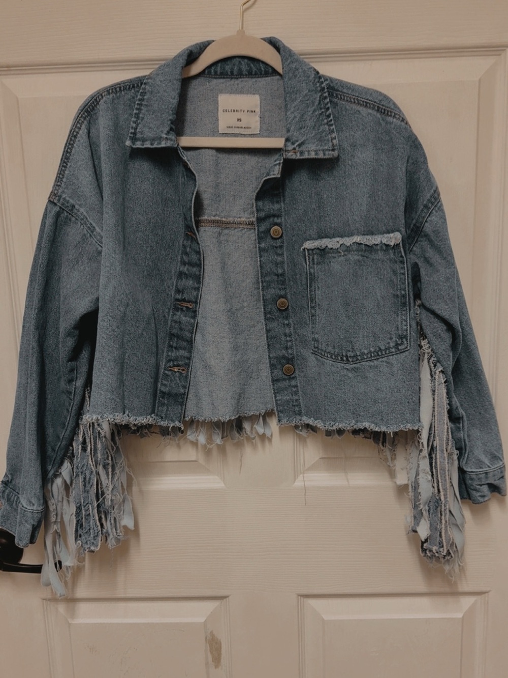 Celebrity Pink Distressed Cropped Denim Jacket in Light Blue with Fringe